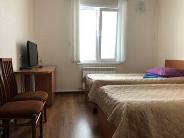Фото номера Номер стандарт с 2 односпальными кроватями Гостиница Поонежье г. Каргополь 3